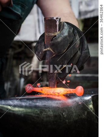 Blacksmith at work 36462864
