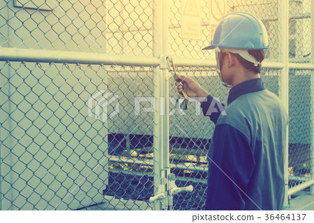 electrician checking and inspect equipment electrician checking and inspect equipment 36464137
