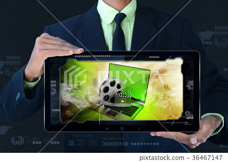 man showing Laptop with reel in frame man showing Laptop with reel in frame 36467147