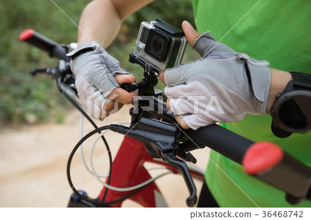 Action camera mounted on mountain bike Action camera mounted on mountain bike 36468742