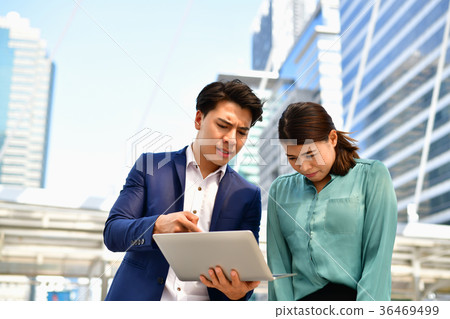 Businessmen are blaming the work of their followers. 36469499