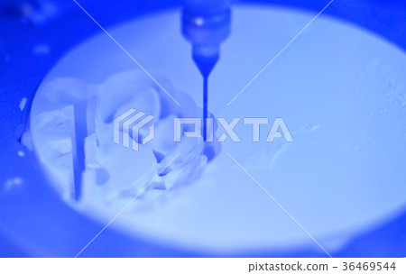 Dental milling machine carving out shape of human Dental milling machine carving out shape of human 36469544
