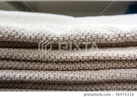 Close up of white towels on shelf Close up of white towels on shelf 36473318