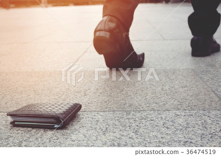 businessman had lost leather wallet  36474519