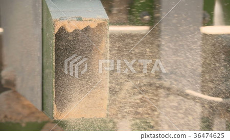 Circular table saw cutting wood in the sawmill Circular table saw cutting wood in the sawmill 36474625