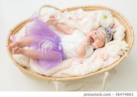 Baby wearing a toy crown (smiles) 36474661