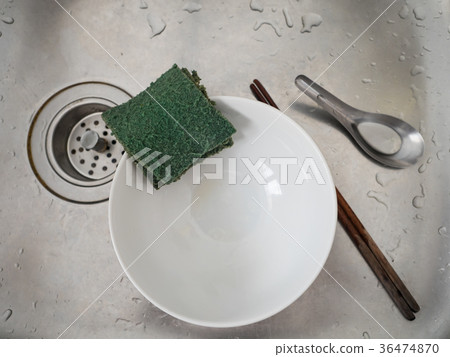 scott bright, bowl, chopsticks and spoon in sink scott bright, bowl, chopsticks and spoon in sink 36474870