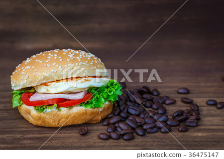 Hamburger on wooden floor 36475147