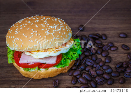 Hamburger on wooden floor Hamburger on wooden floor 36475148