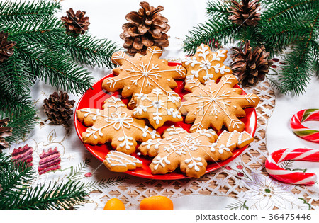 Christmas gingerbread cookies homemade on red  36475446