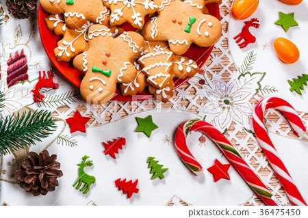 Christmas gingerbread cookies homemade on red  36475450