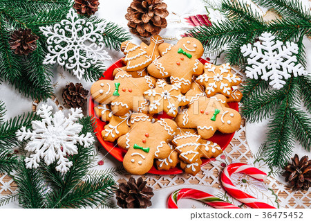 Christmas gingerbread cookies homemade on red  36475452