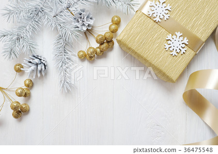 Mockup Christmas gift gold bow and tree cone Mockup Christmas gift gold bow and tree cone 36475548