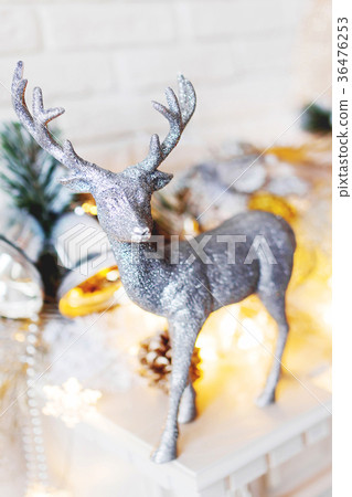 Christmas and New Year decoration with silver deer Christmas and New Year decoration with silver deer 36476253