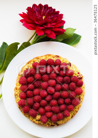 bright raspberry cake on a plate 36478125