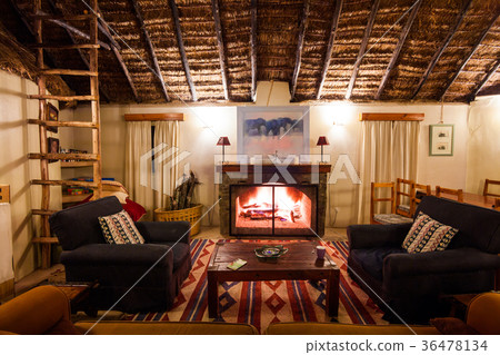 Fireplace room in a cottage in the African savanna 36478134