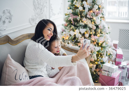 Well-groomed hand of a woman holding a phone Well-groomed hand of a woman holding a phone 36479025
