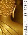 The back of the Buddha in the temple. 36479347