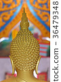 The back of the Buddha in the temple. 36479348