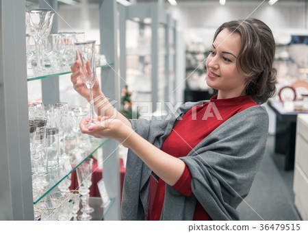 customer choosing crystal glasses utensil dishes customer choosing crystal glasses utensil dishes 36479515
