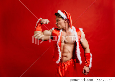christmas holidays. sexy strong santa claus 36479978