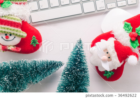 Working table with keyboard, mouse, Christmas sock Working table with keyboard, mouse, Christmas sock 36492622