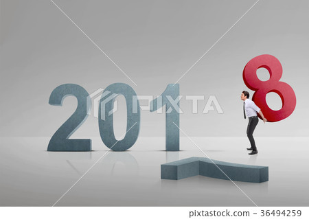 Asian businessman carrying number 8 to make number 36494259
