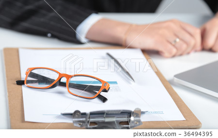 Closeup of white desktop with glasses, notepads, Closeup of white desktop with glasses, notepads, 36494395