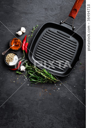 Empty cast-iron grill pan with ingredients Empty cast-iron grill pan with ingredients 36494718