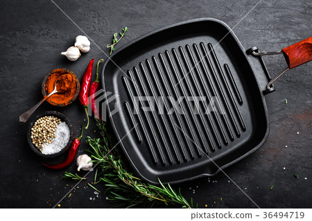 Empty cast-iron grill pan with ingredients Empty cast-iron grill pan with ingredients 36494719