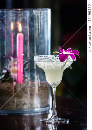 Still life with margarita cocktail and orchids 36496320