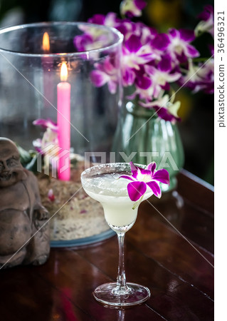 Still life with margarita cocktail and orchids Still life with margarita cocktail and orchids 36496321