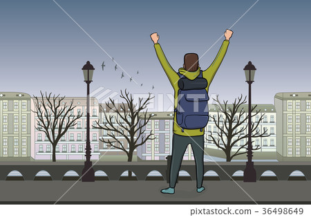 Back view of Happy man on evening walk in the old 36498649