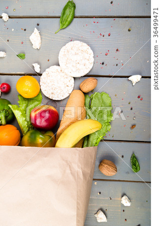 Grocery shopping concept. Different food in paper 36499471