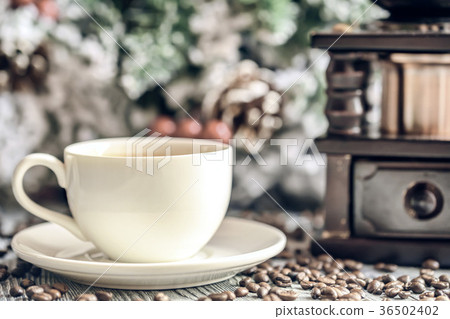Cozy winter setting with cup of coffee 36502402