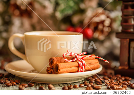 Cozy winter setting with cup of coffee 36502403
