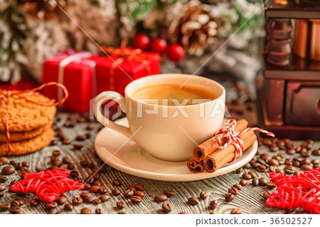 Cozy winter setting with cup of coffee 36502527