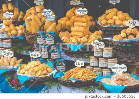 Traditional polish smoked cheese oscypek on market Traditional polish smoked cheese oscypek on market 36503555