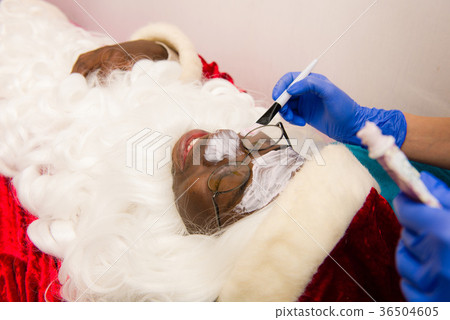 Black santa claus in beauty spa. 36504605