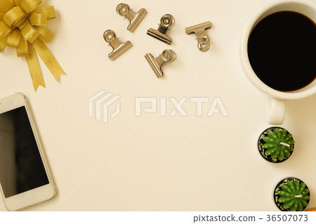 top view of ribbin bow, coffee, phone, paperclip 36507073