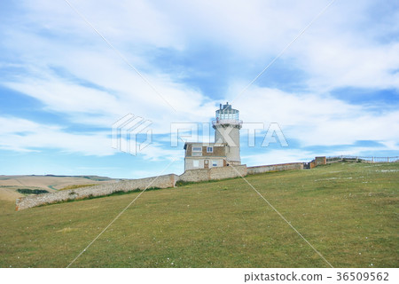 Belle Tout Lighthouse on summer cloudy day Belle Tout Lighthouse on summer cloudy day 36509562