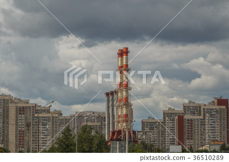 Industrial pipes on gray sky 36510289