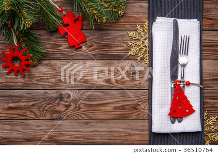 Christmas table place setting with fork and knife Christmas table place setting with fork and knife 36510764