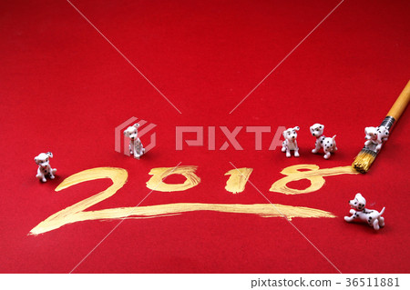 Miniature dogs with year 2018 written in gold Miniature dogs with year 2018 written in gold 36511881
