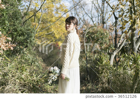 A woman in the forest 36512126