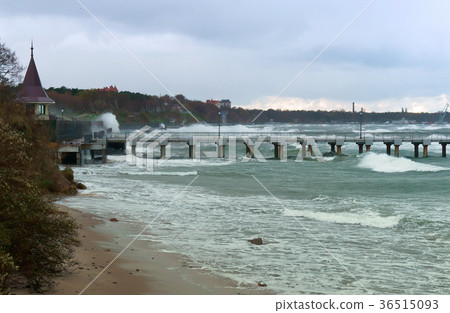 a storm at sea, the waves cover the pier a storm at sea, the waves cover the pier 36515093