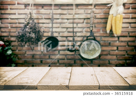 Wood table on vintage kitchen utensils background. Wood table on vintage kitchen utensils background. 36515918