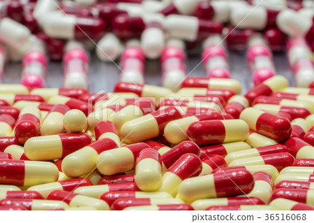 Colorful of antibiotic capsules pills  36516068