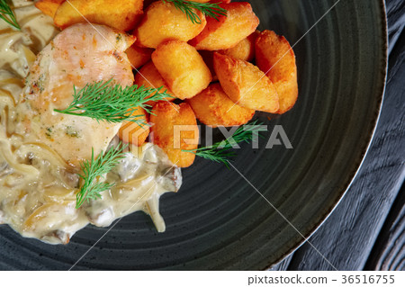 Potato balls with chicken fillet and mushroom Potato balls with chicken fillet and mushroom 36516755