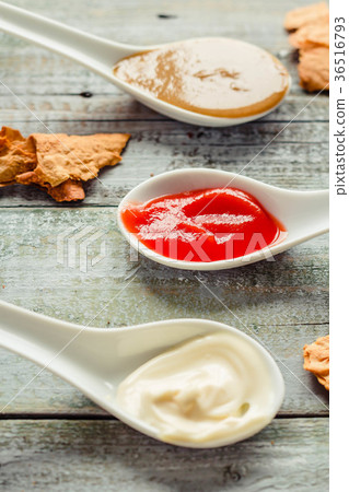 Set of tree classic sauce - ketchup, mayo, mustard 36516793